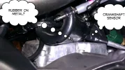 Rubber case where crankshaft and other connections reside.webp
