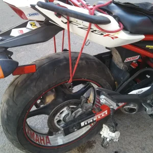 Bungee rope on wheel to help with tire manipulation